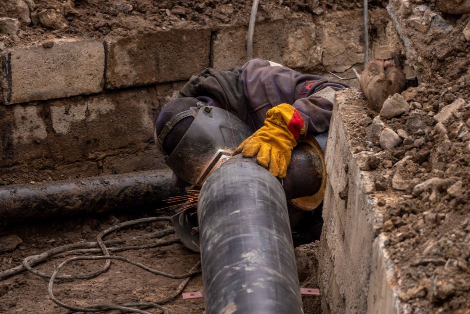 Close-up of drainage pipes and equipment used in drain repair and relining in a Fareham home garden